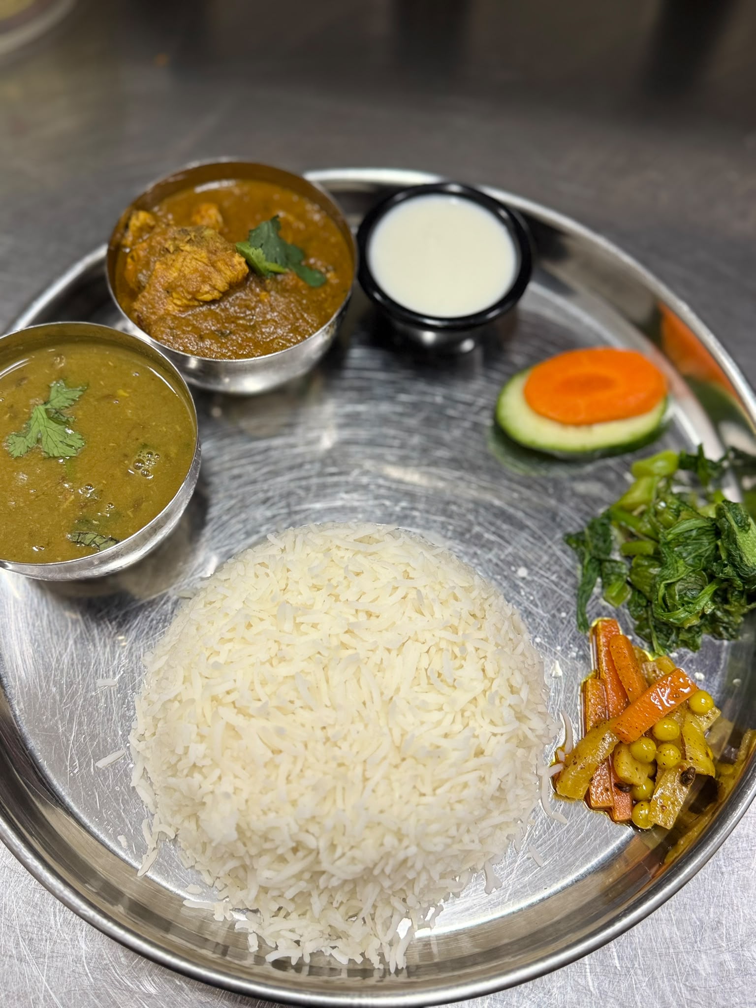 (Chicken/Goat/Veg),Masu/ Matar Paneer, Daal, Bhaat, Saag, Achar